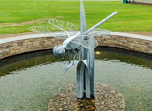 Forged dragonfly sculpture photo