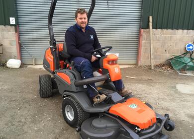 Man on a lawn mower