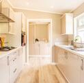 Tingdene Lamport residential park home for sale at Rockbridge Park - kitchen photograph