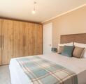 Luxury Lamport residential park home for sale at Rockbridge Park - master bedroom photograph
