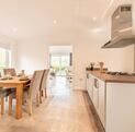 Luxury Cosgrove Lodge residential park home for sale in Wales. Kitchen dining area photo