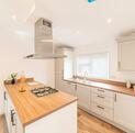 Luxury Cosgrove Lodge residential park home for sale in Wales. Kitchen photo