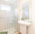 Luxury Cosgrove Lodge residential park home for sale in Wales. En-suite shower room photo