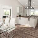 Luxury Cosgrove Lodge residential park home for sale at Rockbridge Park, Presteigne, Wales. Kitchen dining area photo